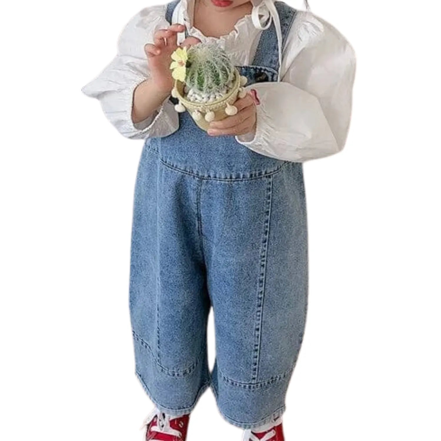 mouvement libre en salopette enfant jean